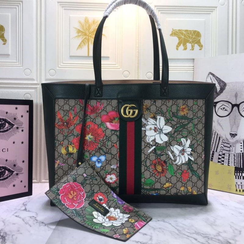 G*u*i shopping bags